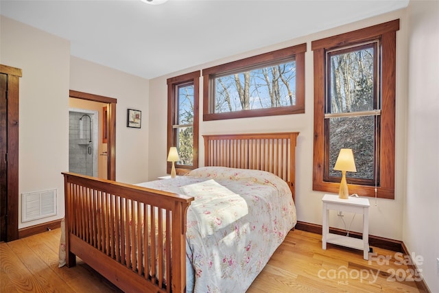 bedroom featuring light hardwood / wood-style floors