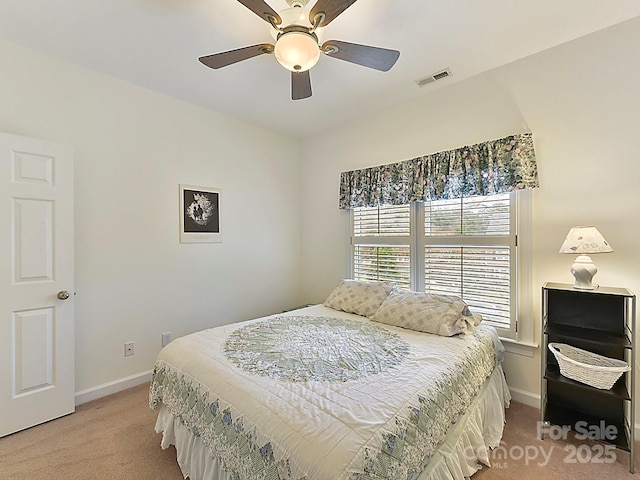 carpeted bedroom featuring ceiling fan