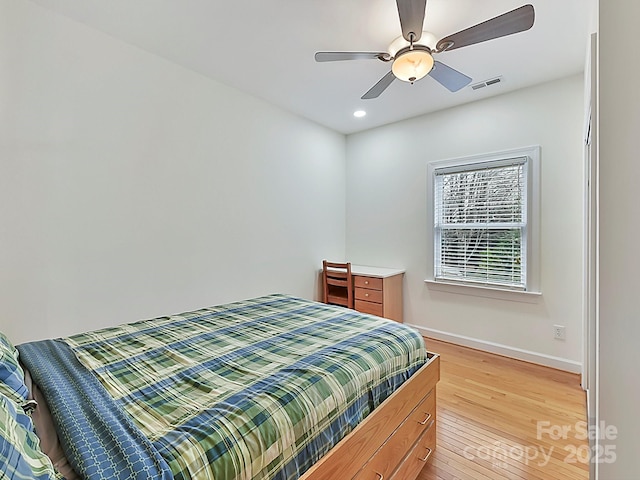 bedroom featuring ceiling fan and light wood-type flooring