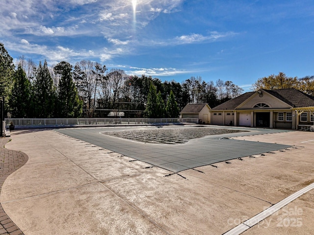 view of swimming pool with a patio