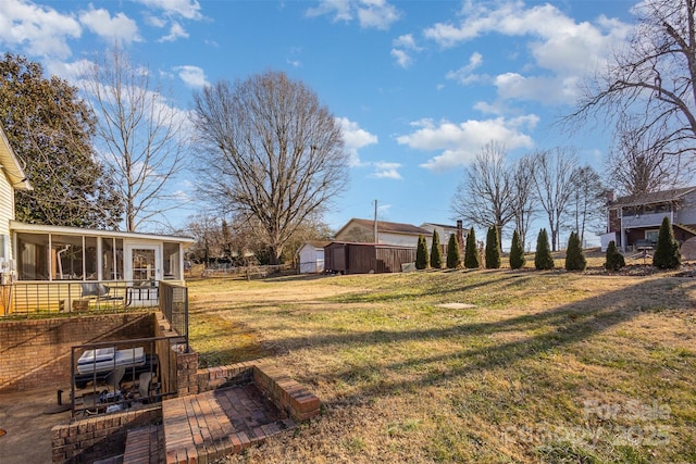 view of yard featuring a sunroom