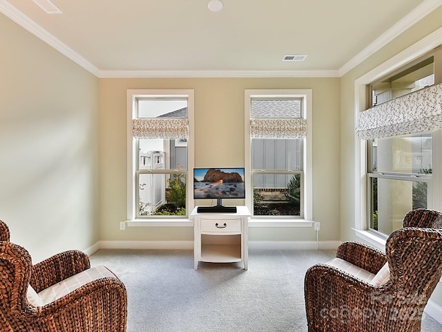 sitting room featuring light carpet and ornamental molding