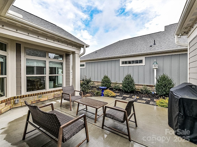 view of patio featuring grilling area and outdoor lounge area