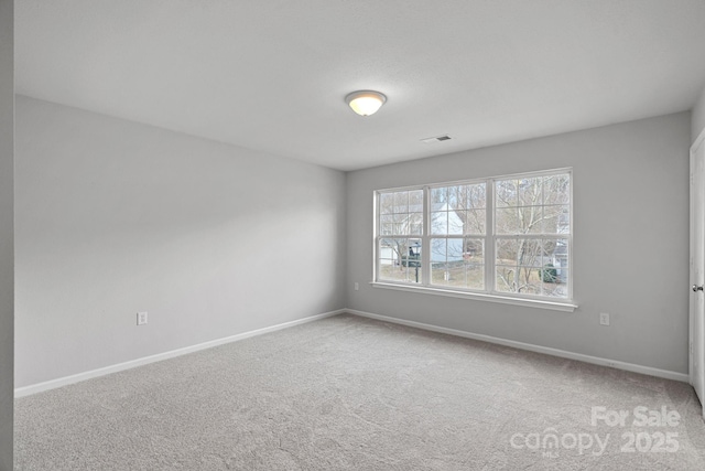 view of carpeted spare room