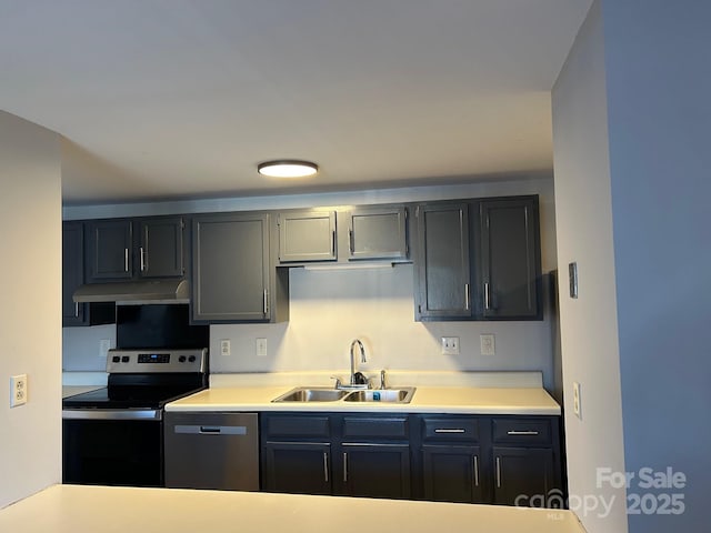 kitchen with appliances with stainless steel finishes and sink