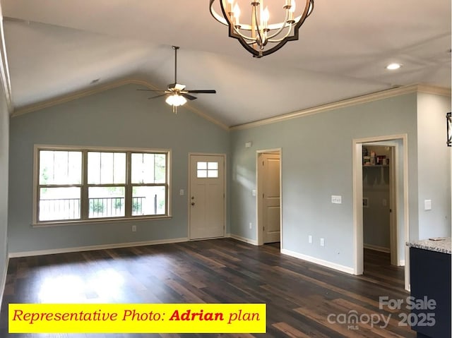 entryway with lofted ceiling, ceiling fan with notable chandelier, ornamental molding, and dark hardwood / wood-style floors