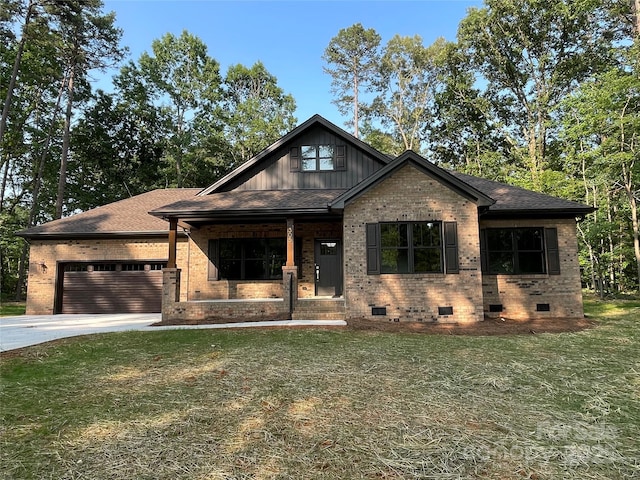 305 General As Johnston St, Stanley, NC 28164 - view of front facade with crawl space, brick siding, a porch, a garage, and concrete driveway