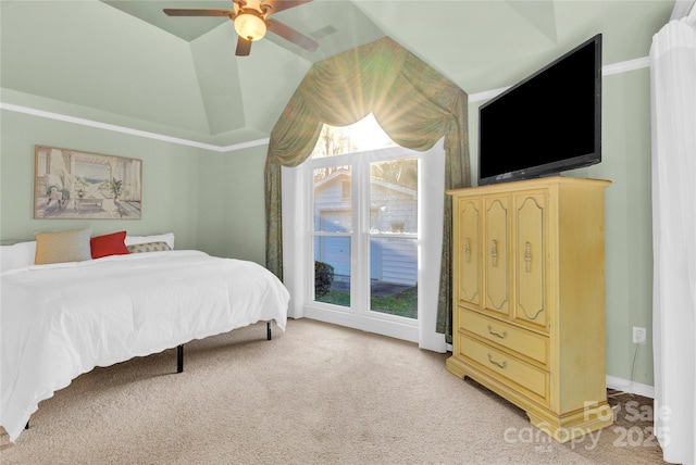 carpeted bedroom with lofted ceiling and ceiling fan