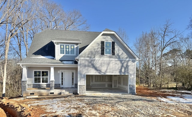 view of front of house with crawl space and a shingled roof