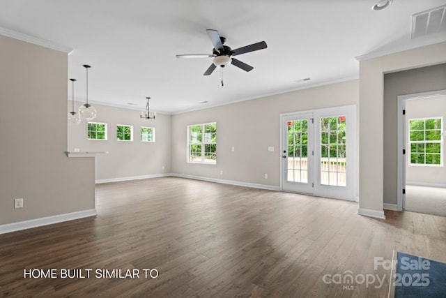 unfurnished living room featuring ornamental molding, dark wood finished floors, and visible vents