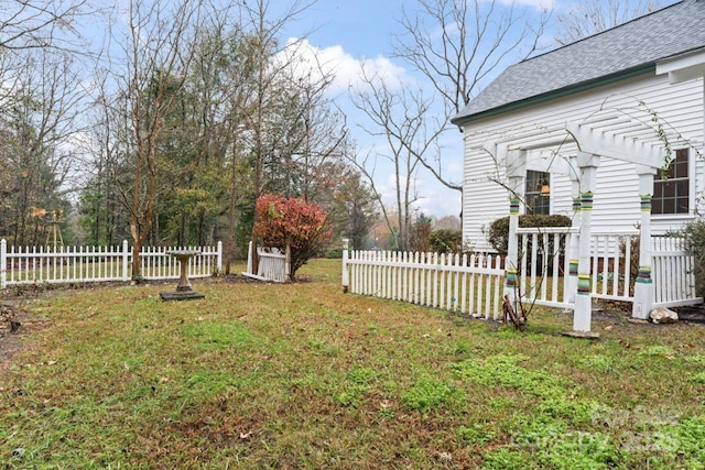 view of yard with a pergola