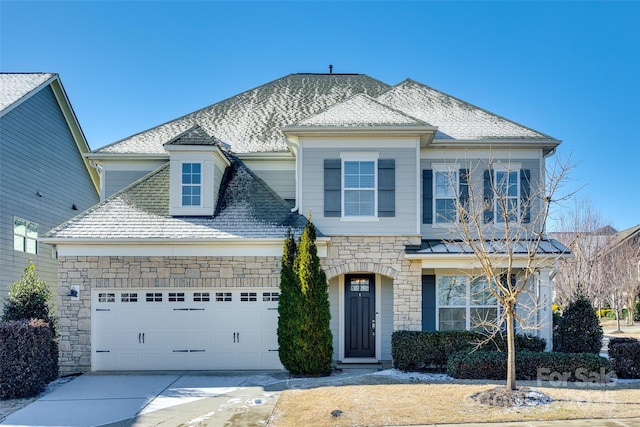 view of front of home featuring a garage