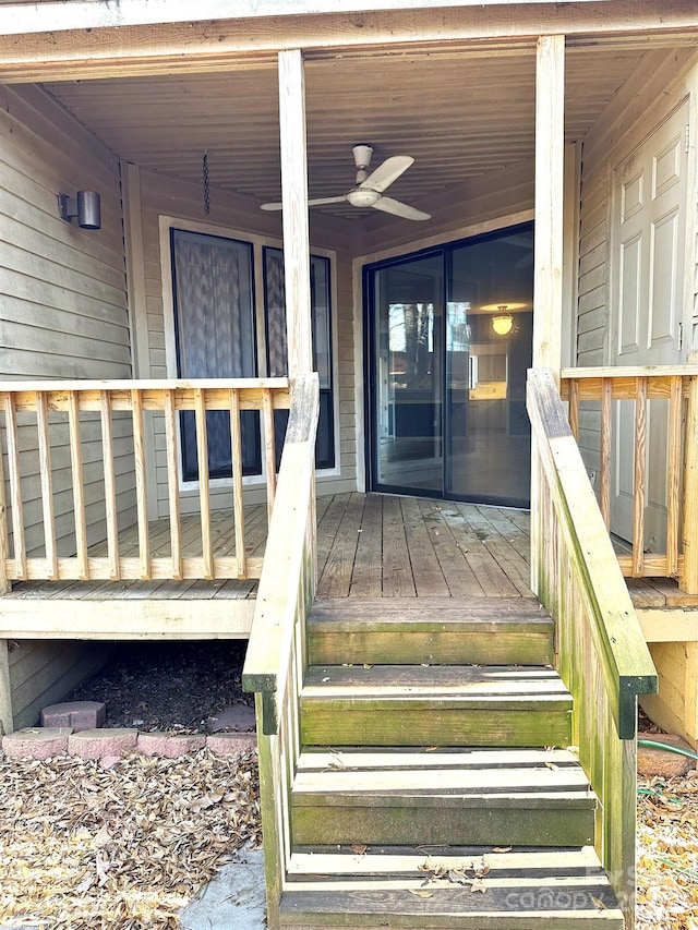 entrance to property with ceiling fan