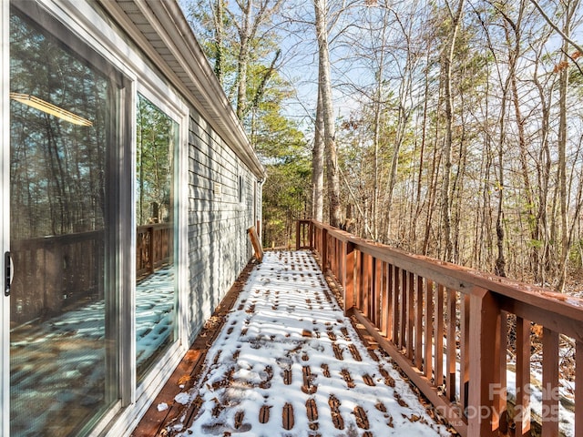 view of snow covered deck