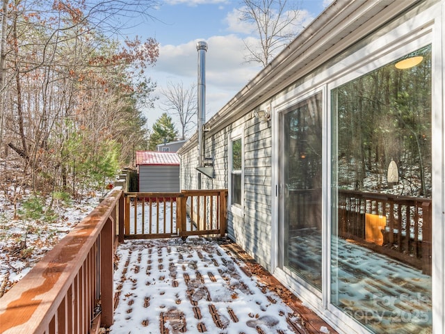 view of snow covered deck