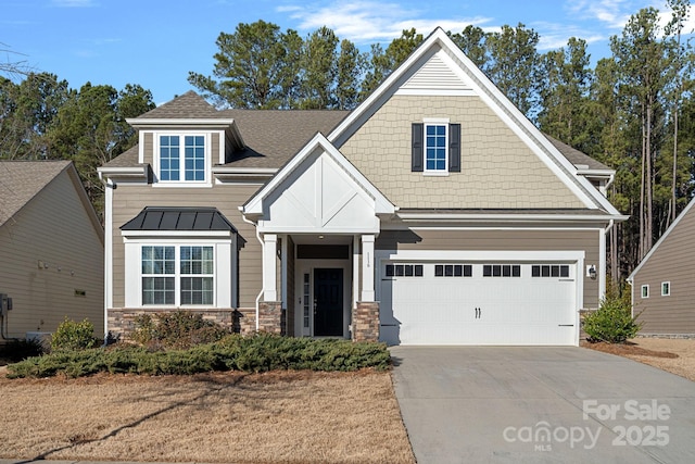 craftsman inspired home with a garage