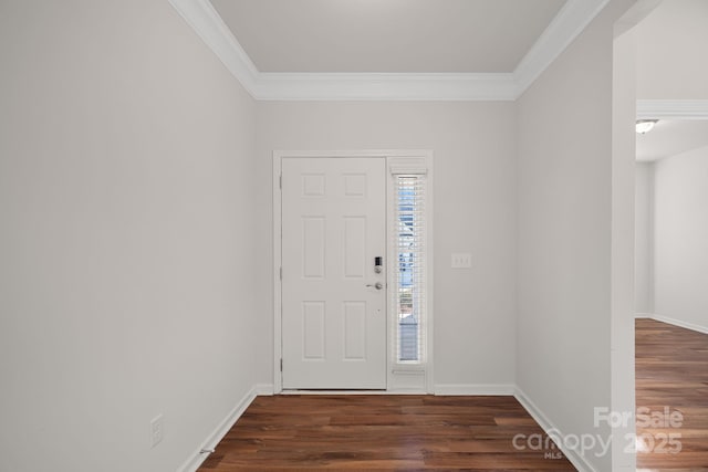 entryway with dark wood-type flooring and ornamental molding