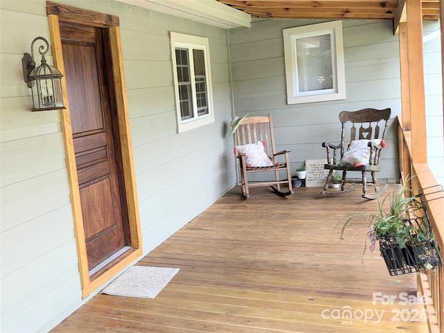 wooden terrace with covered porch