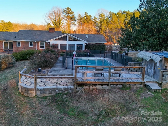 view of pool with a deck