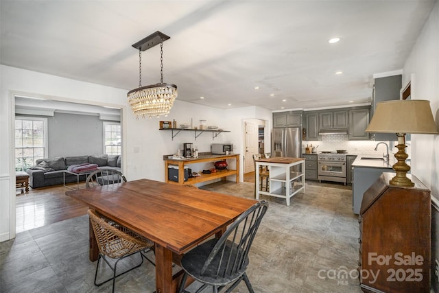 dining room featuring sink