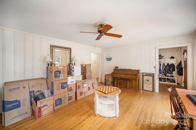 interior space with hardwood / wood-style floors and ceiling fan