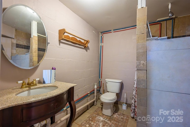 bathroom featuring sink and toilet