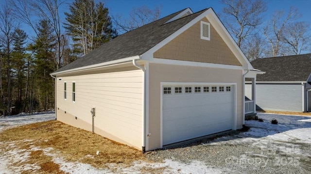 view of snow covered garage