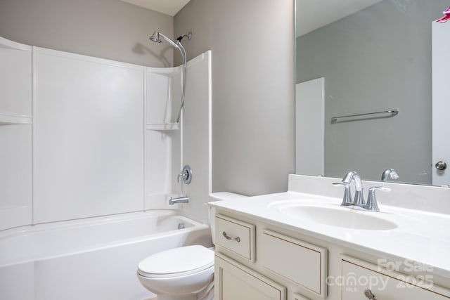 full bathroom with tub / shower combination, toilet, and vanity