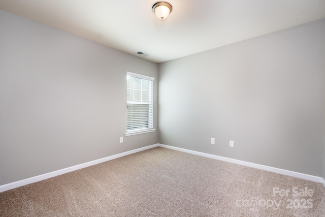 view of carpeted spare room