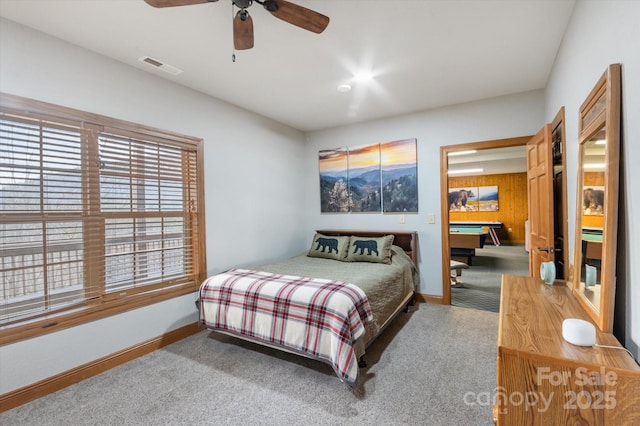 carpeted bedroom with ceiling fan