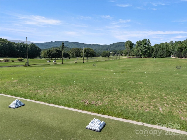 surrounding community with a mountain view