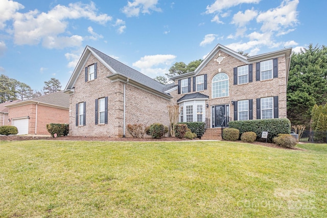 view of front of home featuring a front yard