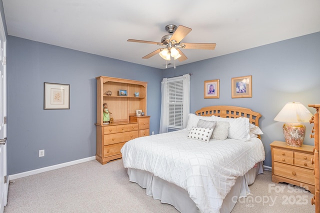 bedroom with light colored carpet and ceiling fan