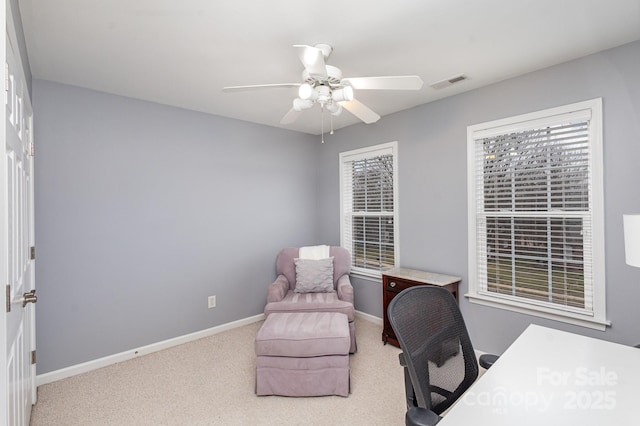 office area featuring ceiling fan and carpet flooring