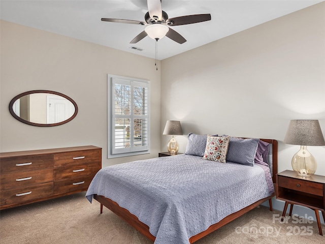 carpeted bedroom featuring ceiling fan