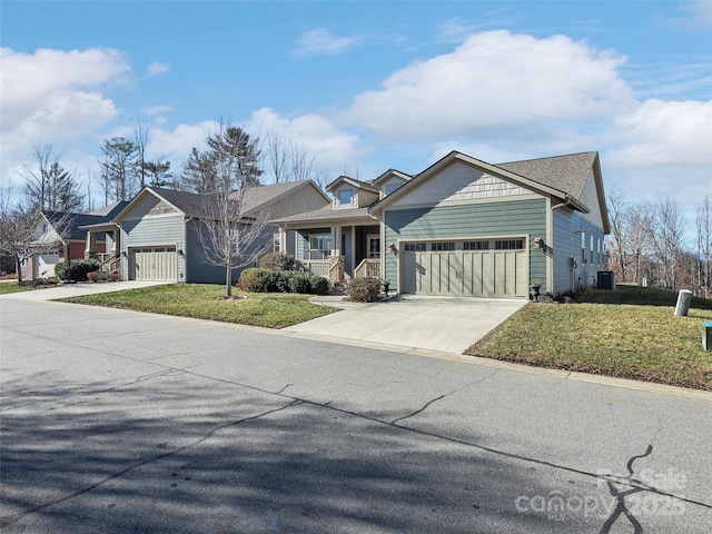 view of front of home featuring a garage, central AC, a porch, and a front lawn