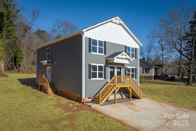 view of front property with a patio area and a front lawn