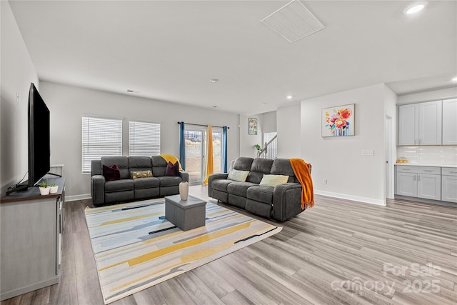 living room featuring light hardwood / wood-style flooring