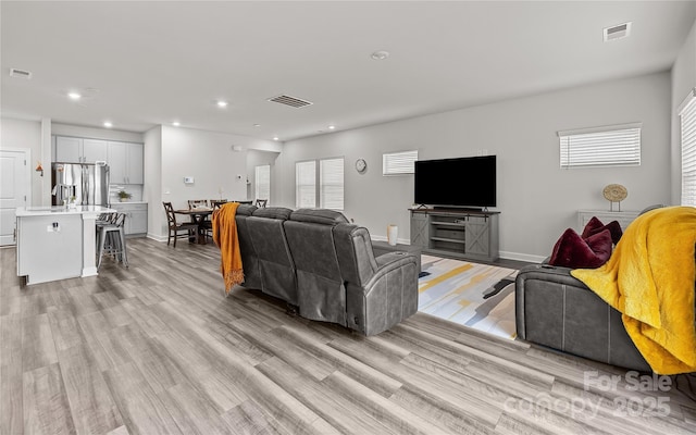 living room featuring light hardwood / wood-style flooring