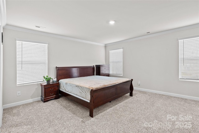 carpeted bedroom featuring ornamental molding