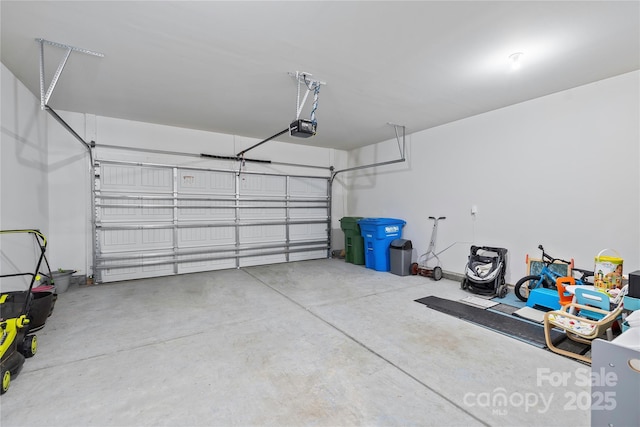 garage featuring a garage door opener