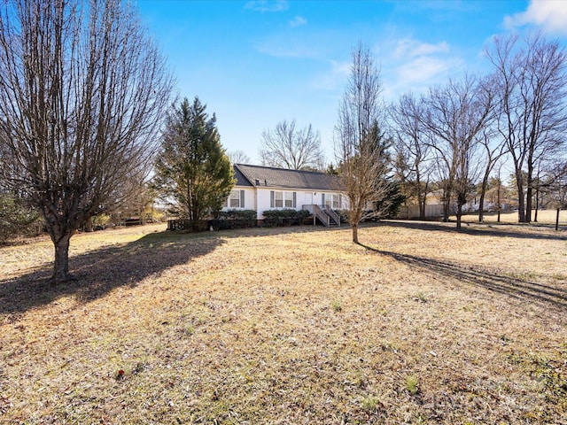 view of front of house with a front lawn