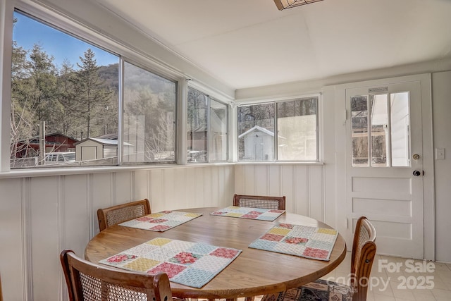 sunroom / solarium featuring plenty of natural light