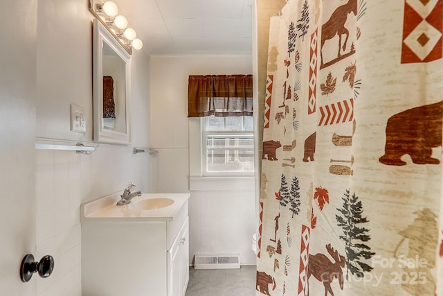 bathroom featuring a shower with curtain, tile patterned flooring, tile walls, and vanity