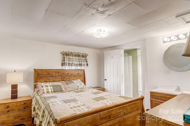 bedroom with sink