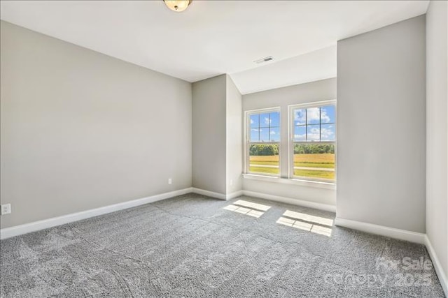 view of carpeted spare room