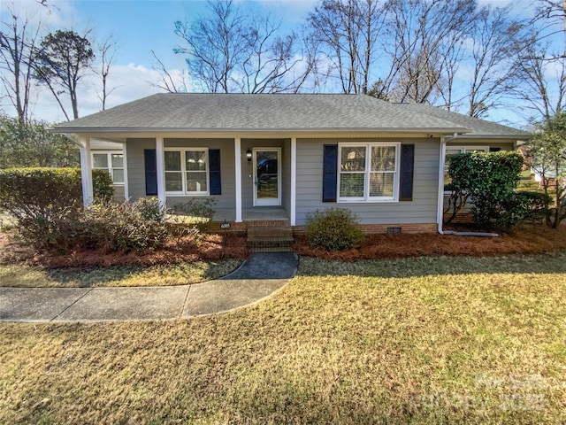 ranch-style house with a front yard and a porch