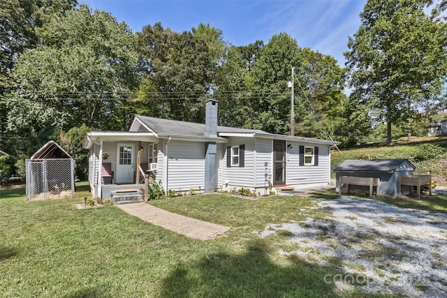 ranch-style house with a front lawn