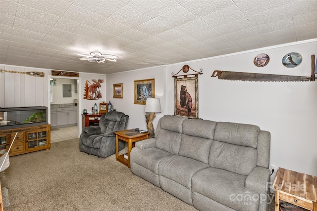 carpeted living room featuring ornamental molding