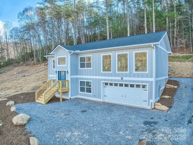 split foyer home featuring a garage